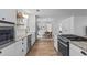 Gourmet kitchen with an island cooktop, stainless appliances and granite countertops at 2565 Bates Se St, Smyrna, GA 30080