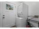 Laundry room featuring modern washer and dryer and window at 2565 Bates Se St, Smyrna, GA 30080