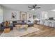 Bright living room featuring a comfortable sofa, stylish decor, and a seamless flow to the kitchen at 2565 Bates Se St, Smyrna, GA 30080