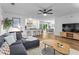 Open-concept living space with a modern kitchen, stylish furnishings, and a seamless flow for entertaining at 2565 Bates Se St, Smyrna, GA 30080