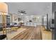 Open-concept living area with hardwood floors, modern furnishings, and abundant natural light at 2565 Bates Se St, Smyrna, GA 30080