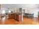 Open dining area with hardwood floors and adjacent kitchen at 2690 Derby Ne Walk # 53, Atlanta, GA 30319