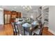 Open-concept dining area with hardwood floors and an adjacent coffee bar nook at 2690 Derby Ne Walk # 53, Atlanta, GA 30319