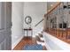 Inviting foyer with hardwood floors and staircase at 2690 Derby Ne Walk # 53, Atlanta, GA 30319
