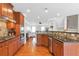 Eat-in kitchen with hardwood floors and stainless steel appliances at 2690 Derby Ne Walk # 53, Atlanta, GA 30319