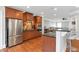 Kitchen with stainless steel refrigerator and bar seating at 2690 Derby Ne Walk # 53, Atlanta, GA 30319