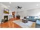 Cozy living room featuring a fireplace and hardwood flooring at 2690 Derby Ne Walk # 53, Atlanta, GA 30319