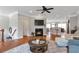Open-concept living area with fireplace and bar seating at 2690 Derby Ne Walk # 53, Atlanta, GA 30319