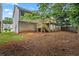 View of the backyard with a wooden deck and a partial fence at 2746 Sanibel Se Ln, Smyrna, GA 30082
