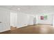 Unfinished basement with painted walls, tile ceiling, doorway, and bathroom in the adjacent room at 2746 Sanibel Se Ln, Smyrna, GA 30082