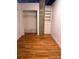 Empty closet with hardwood floors and built in shelving unit at 3235 Roswell Ne Rd # 521, Atlanta, GA 30305