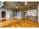 Hardwood floors flow throughout the spacious living area, complemented by modern lighting at 3235 Roswell Ne Rd # 521, Atlanta, GA 30305