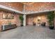 Spacious lobby with brick walls, modern furniture, large windows, and inviting decor at 3235 Roswell Ne Rd # 521, Atlanta, GA 30305