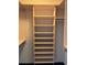 Spacious walk-in closet features custom built-in shelving for optimal organization and storage solutions at 3235 Roswell Ne Rd # 521, Atlanta, GA 30305