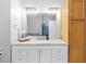 Bathroom featuring a white vanity with double sinks and shower in the background at 375 Highland Ne Ave # 913, Atlanta, GA 30312