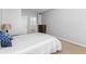 Comfortable bedroom featuring neutral walls, carpeting, and a walk-in closet at 375 Highland Ne Ave # 913, Atlanta, GA 30312