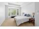 Bedroom with neutral walls, bay window with tree view, and trey ceiling at 375 Highland Ne Ave # 913, Atlanta, GA 30312