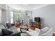 Living room features a cozy seating area and natural light with stairway access at 375 Highland Ne Ave # 913, Atlanta, GA 30312