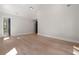 Large bedroom with hardwood floors, modern ceiling fan and plenty of natural light at 4091 Oak Forest Ne Dr, Brookhaven, GA 30319