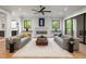 Bright living room with sofas facing each other and modern lighting at 4091 Oak Forest Ne Dr, Brookhaven, GA 30319