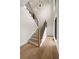 Staircase with high ceilings, hardwood floors, black metal railings and white walls at 4091 Oak Forest Ne Dr, Brookhaven, GA 30319