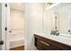 Modern bathroom with custom vanity and adjacent access to bath and shower at 110 Peach Pointe Dr, Mcdonough, GA 30253