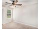 Neutral bedroom features carpet floors, a ceiling fan, and a window at 110 Peach Pointe Dr, Mcdonough, GA 30253