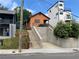 Cozy orange home featuring an elevated position, with stair access and modern design elements, great curb appeal at 226 Walnut Nw St, Atlanta, GA 30314