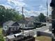 Picturesque street featuring diverse architectural styles, tree-lined sidewalks, and charming residential setting at 226 Walnut Nw St, Atlanta, GA 30314