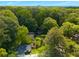 Beautiful aerial shot of a home nestled in a lush, wooded neighborhood at 3176 Gablewood Ct, Decatur, GA 30033