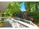 Back deck with view of lush trees at 3176 Gablewood Ct, Decatur, GA 30033