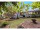Private backyard with patio, playset, and firepit at 3176 Gablewood Ct, Decatur, GA 30033