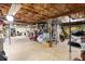 Unfinished basement with exposed ceiling, concrete floor, and ample storage space at 3176 Gablewood Ct, Decatur, GA 30033