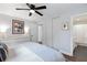 Bright bedroom with hardwood floors, neutral paint, and an ensuite bathroom at 3176 Gablewood Ct, Decatur, GA 30033