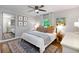 Cozy bedroom with neutral tones, hardwood floors, and a large window at 3176 Gablewood Ct, Decatur, GA 30033