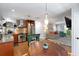 Kitchen open to living space with stainless appliances and hardwood floors at 3176 Gablewood Ct, Decatur, GA 30033