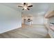 Large living area with fireplace and natural light from multiple windows at 324 Tulip Dr, Covington, GA 30016