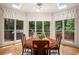 Bright breakfast nook features lots of natural light and a view of the wooded lot at 3845 Winters Hill Dr, Atlanta, GA 30360