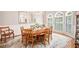 Traditional dining room with hardwood floors, chandelier, and plentiful natural light at 3845 Winters Hill Dr, Atlanta, GA 30360