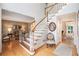 Open foyer with hardwood floors, staircase, and views into the formal sitting room at 3845 Winters Hill Dr, Atlanta, GA 30360