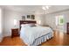 Main bedroom features hardwood floors and access to the main bathroom at 3845 Winters Hill Dr, Atlanta, GA 30360