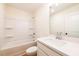 Bathroom featuring a shower-tub combo, single vanity, and modern fixtures at 405 Carrera Ln, Acworth, GA 30102