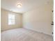Cozy bedroom with neutral carpet, a window, and ample natural light at 405 Carrera Ln, Acworth, GA 30102