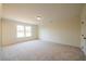 Cozy bedroom featuring plush carpet, natural light and large windows at 405 Carrera Ln, Acworth, GA 30102