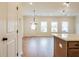 A new kitchen with quartz countertops, hardwood floors and stainless steel appliances at 405 Carrera Ln, Acworth, GA 30102