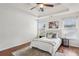 Charming bedroom with a coffered ceiling and hardwood floors offers a relaxing space at 5273 High Tide Ct, Atlanta, GA 30349