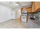 Spacious eat-in kitchen features modern appliances and granite countertops at 5273 High Tide Ct, Atlanta, GA 30349