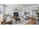 Bright living room with a fireplace, seating, and an open layout for easy entertaining at 5273 High Tide Ct, Atlanta, GA 30349