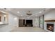 Finished basement boasts a fireplace, media center and wet bar, great for entertaining at 9179 Selborne Ln, Chattahoochee Hills, GA 30268