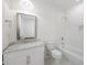 Bathroom with a white vanity, marble countertop, and subway tile shower at 9179 Selborne Ln, Chattahoochee Hills, GA 30268